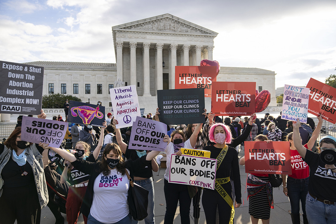 Pro-choice and anti-abortion demonstrators rally outside the U.S. Supreme Court.